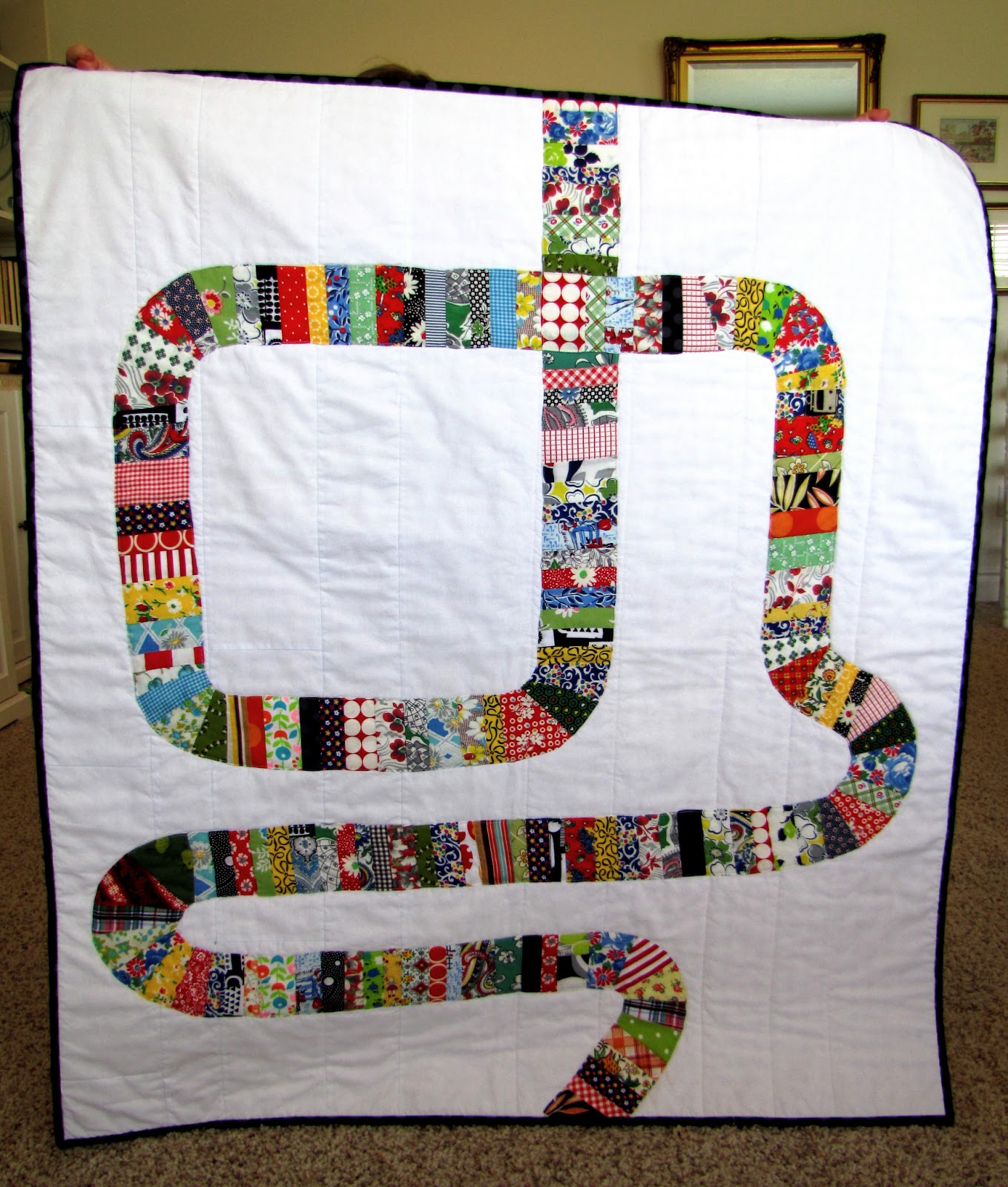 http://snippysisters.blogspot.com/2013/06/road-to-recovery-quilt-for-joyces.html