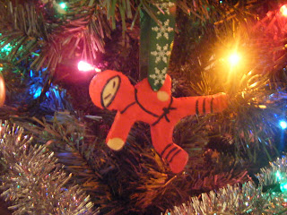 red ninja salt dough christmas ornament hung on christmas tree