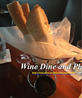 A bread starter with olive dip at the Mad Fish restaurant in St Pete Beach, Florida