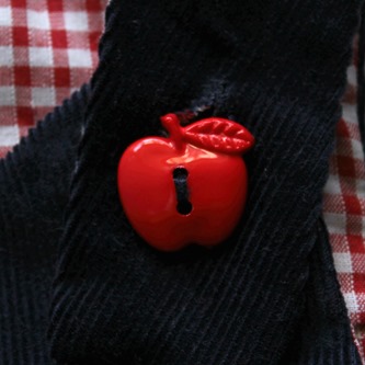 Pinafore button