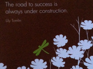 Lily Tomlin quote: Road to success is always under construction