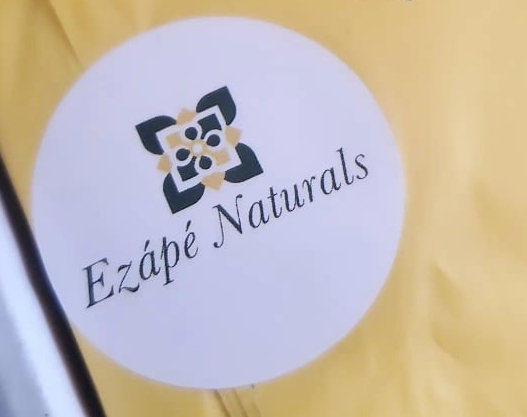 Ezape Naturals sustainable beauty brand sticker on yellow tissue paper