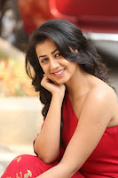 Nikki Galarani Sizzling Photos in Red web.filmyfi.com