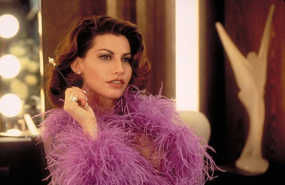 Overexposed oversexed and unduly catty in 1995's Showgirls Gina Gershon's