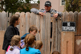 Trent Nelson | The Salt Lake Tribune Colorado City Town Marshal Sam Johnson tells an FLDS woman who had been evicted from her Colorado City, AZ, home, that she will be allowed to retrieve her belongings from the yard, Wednesday May 10, 2017.