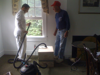 Rob and Sherrill getting the bee-vac ready