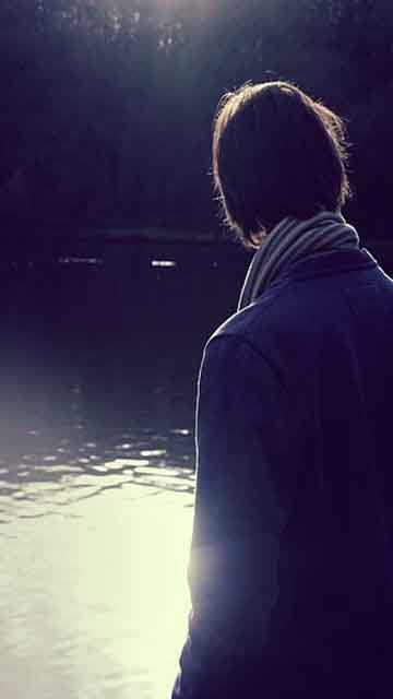 Long haired Boy with scarf Standing 