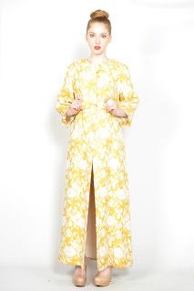 Vintage 1960's yellow and gold brocade maxi jacket with bow detail in front.