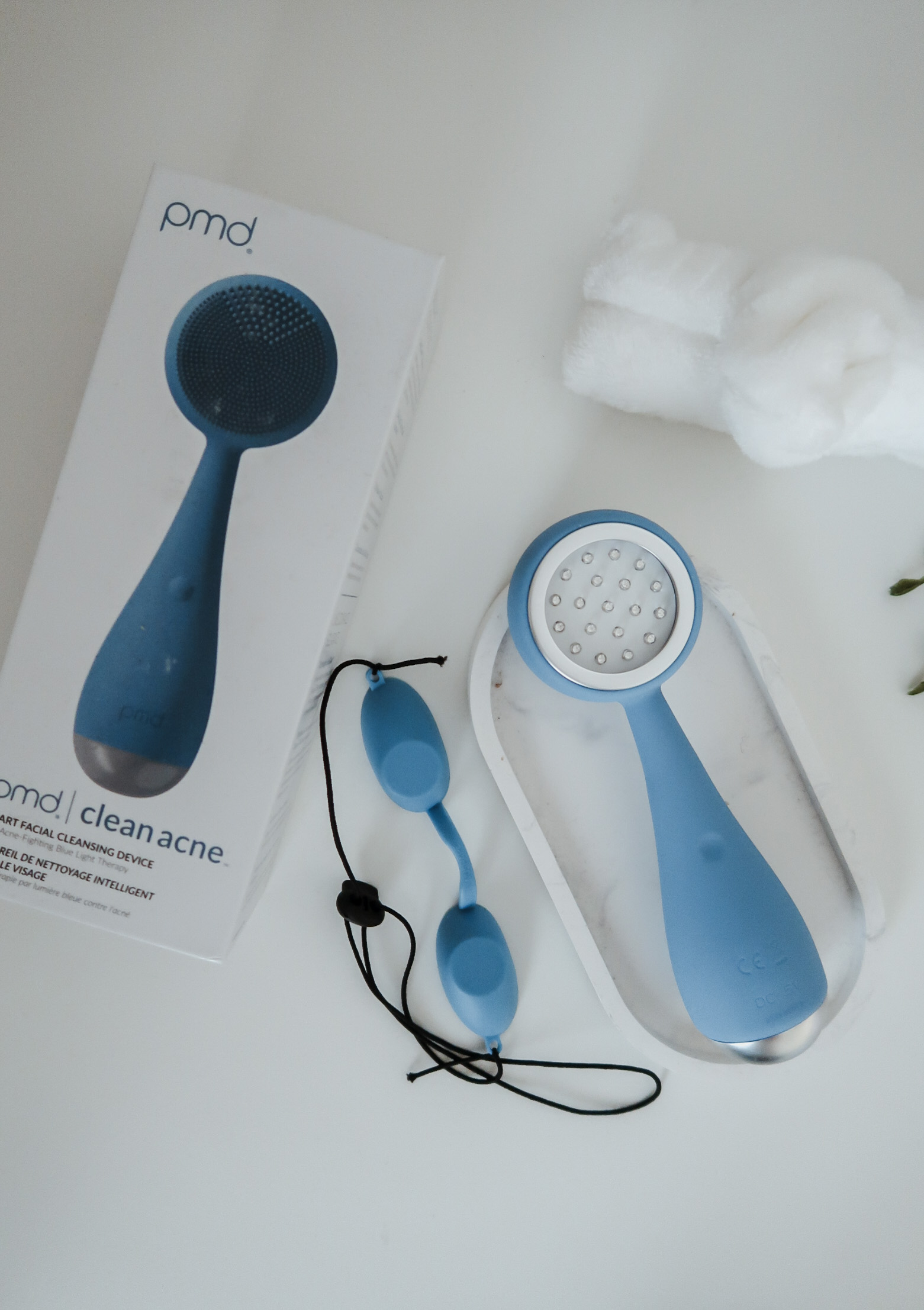 PMD Clean Acne smart facial cleansing device.