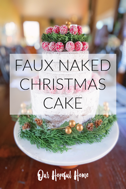 faux naked Christmas cake decorated with frosted berries