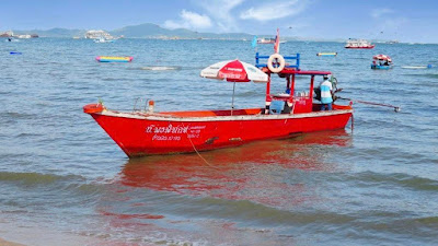 Boats Parked Around the Tourist Service at Pattaya Beach, 1980: The Rise of the Tourism Industry.