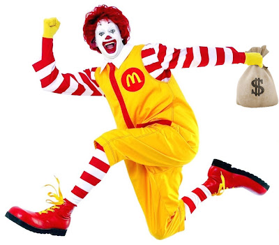 Ronald McDonald running with a bag o' money