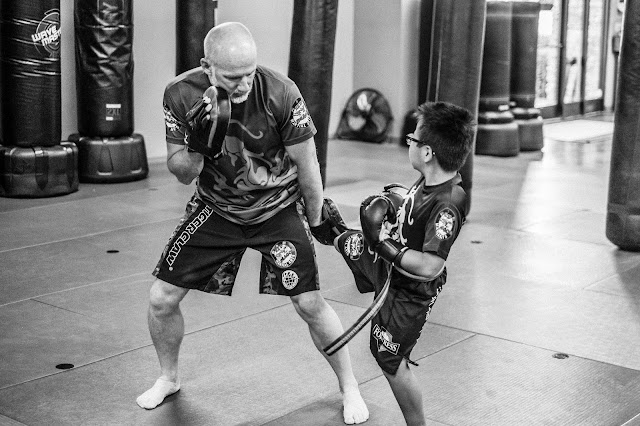 kids practicing kickboxing combinations at red dragon martial arts in morristown TN