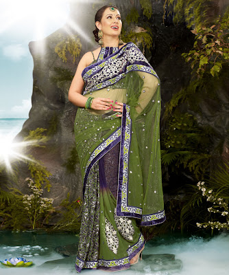 Preeti Jhangiani BRAND: Ambica Fashion CATEGORY: Saree with Unstitched Blouse COLOUR: Mehendi and Blue MATERIAL: Net and Brasso Net pallu body Brasso - Ribbon work