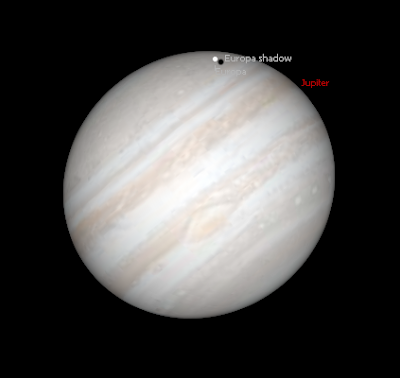 simulated view of Jupiter and Europa