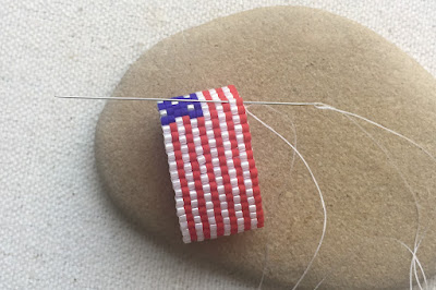 Weaving in thread ends in beadwork ring