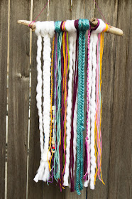 easy diy boho yarn wall hangings- super fun craft to make with the kids- all you need are sticks, yarn, and beads