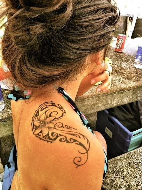Tattoo with Aqua Flower Design on Shoulder