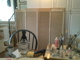 Shutters purchased at a yard sale will become my display panels for framed artwork.