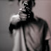 JUNIOR HIGH SCHOOL STUDENT THREATENS HEADMASTER WITH GUN