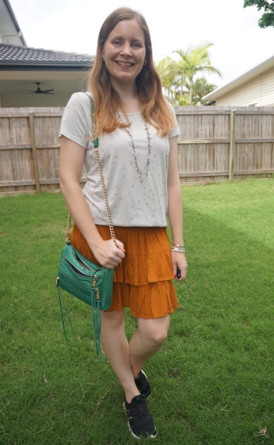 star print foil tee with rust ruffle mini skirt sneakers and green rebecca minkoff 5 zip bag | awayfromblue