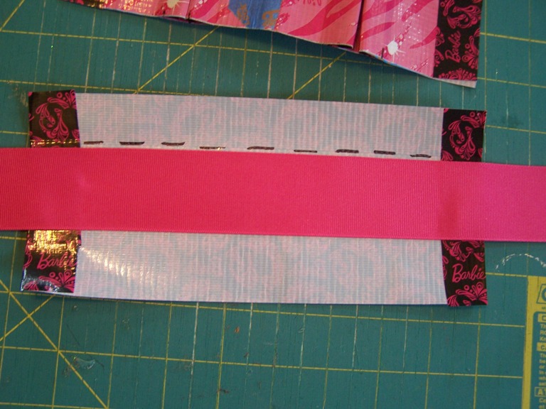 Cutting the duct-tape form into pattern pieces