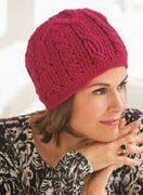 http://www.letsknit.co.uk/free-knitting-patterns/cabled-crochet-beret