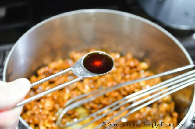 Toffee Walnuts recipe stir in vanilla from Serena Bakes Simply From Scratch.