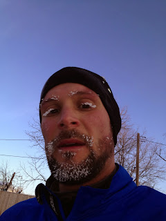 Beard, eye brows and eye lashes have accumulated ice from the moisture in my breat while running to work on a 2 degree morning