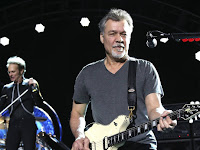 Rock guitarist Eddie Van Halen dies at 65 after cancer battle.