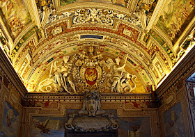  painted architecture at end of corridor at the sistine chapel