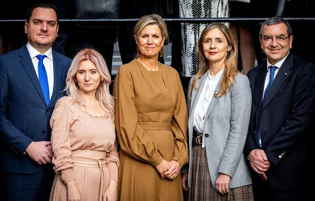 Queen Maxima wore a beige Madame wool coat by Max Mara, and Florinata midi dress by Zeus + Dione