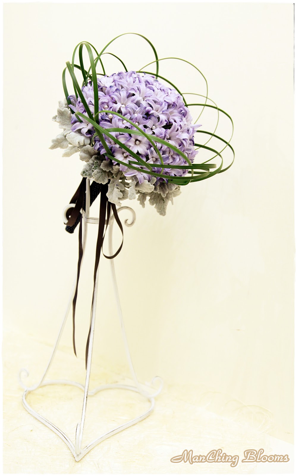 A mauve /blue wedding bouquet