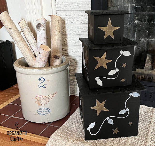 Photo of a thrifted wooden canister set upcycled with chalk paint and Christmas Graphics stencils.