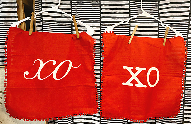 napkins with xo stenciled hanging to dry