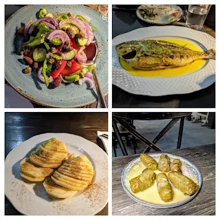 What to eat in Nafplio: fresh fish, Greek salad, stuff grape leaves, and apples at Karima Kastro