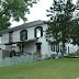 Historic Home endangered by junkyard development