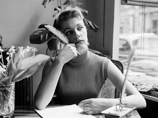 vintage photo of girl thinking what to write