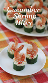 Food Lust People Love: Cheesy cucumber shrimp bites are a quick and easy cocktail party appetizer of fresh cucumber cups filled with spicy cheese and topped with beautiful boiled shrimp, their tails festively aloft.