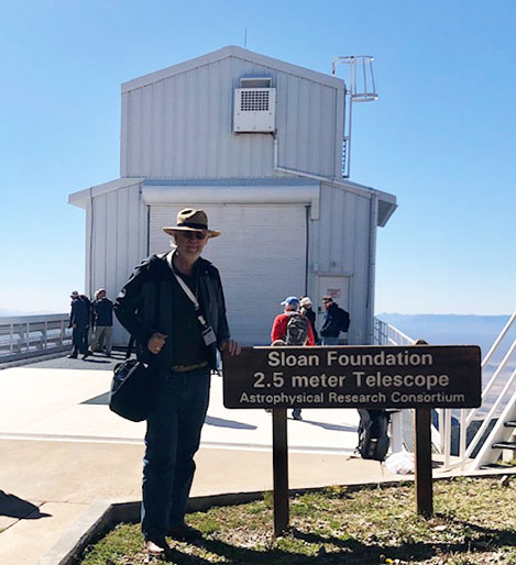 Resident Astronomer George at the Sloan Foundation 2.5 meter Telescope (Source: Palmia Observatory)