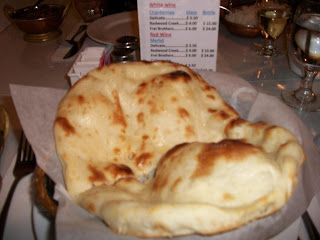 Click to enlarge -Naan, tandoori clay-oven baked bread.