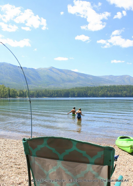 Slowly making their way further into the cold water of Lake McDonald.