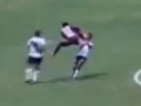 Peru football player delivers flying kick to opponent