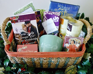 Christmas Gift Basket, gift basket, wune, chocolate, Christmas, tea cup, Christmas romance novel, christmas book, ornaments, tea towel, miracle on 34th street, tea