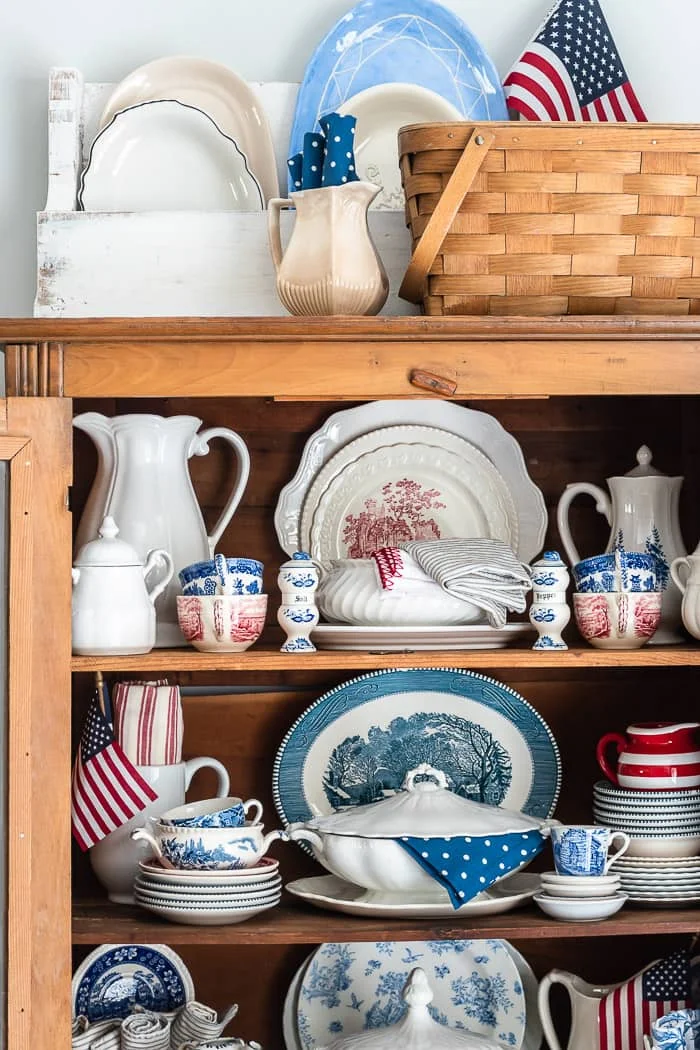 patriotic decorated hutch using vintage dishes, chippy wood, ironstone and wicker