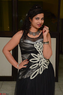 Shrisha Dasari in Sleeveless Short Black Dress At Follow Follow U Audio Launch 018.JPG