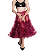 Black bullet bra, red long sheer petticoat.
