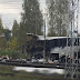 Train hits bus in Russia, killing at least 19 people