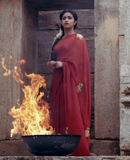 Keerthy Suresh in Red Saree with cute Expressions in Mahanati Working Stills