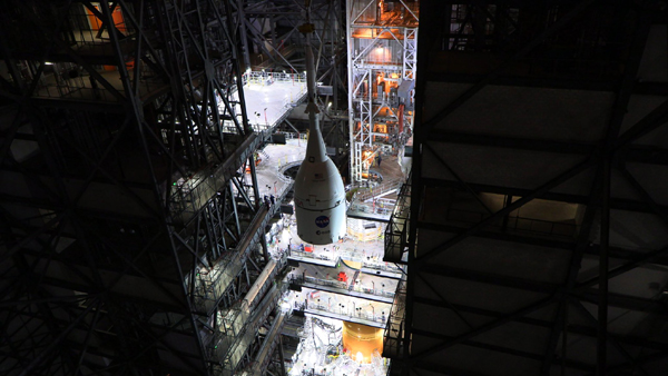 Inside Kennedy Space Center's Vehicle Assembly Building in Florida, the Orion capsule is transferred over to High Bay 3 where it will be secured to NASA's Space Launch System rocket...on October 20, 2021.